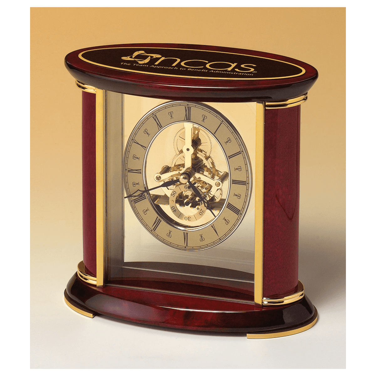 Skeleton clock with sub-second dial, brass finish movement, and rosewood piano accents