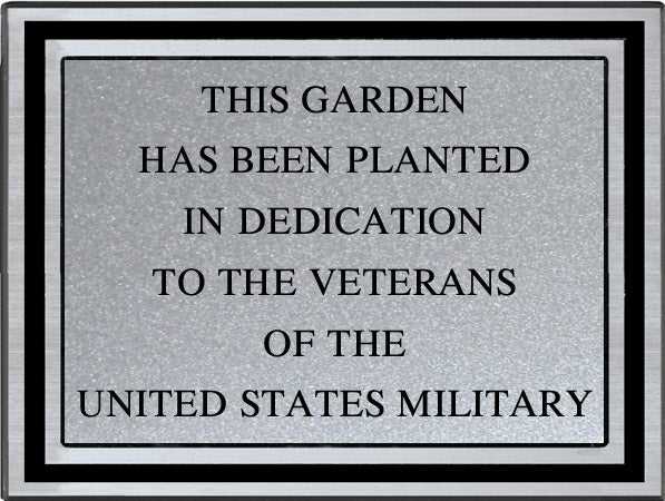 Black cast aluminum dedication plaque with engraved brushed silver plate, front view