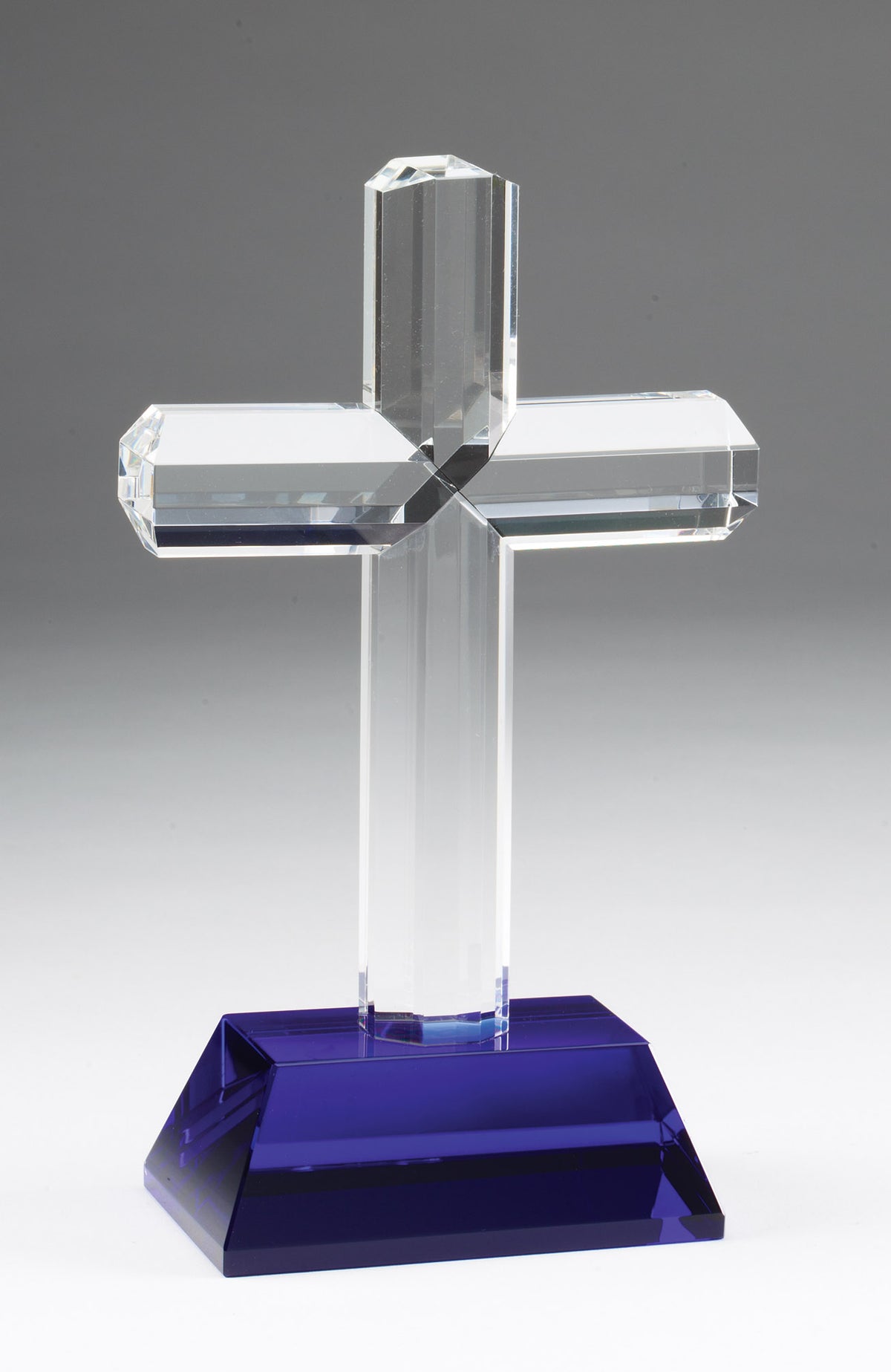 Clear crystal cross award on a blue crystal base