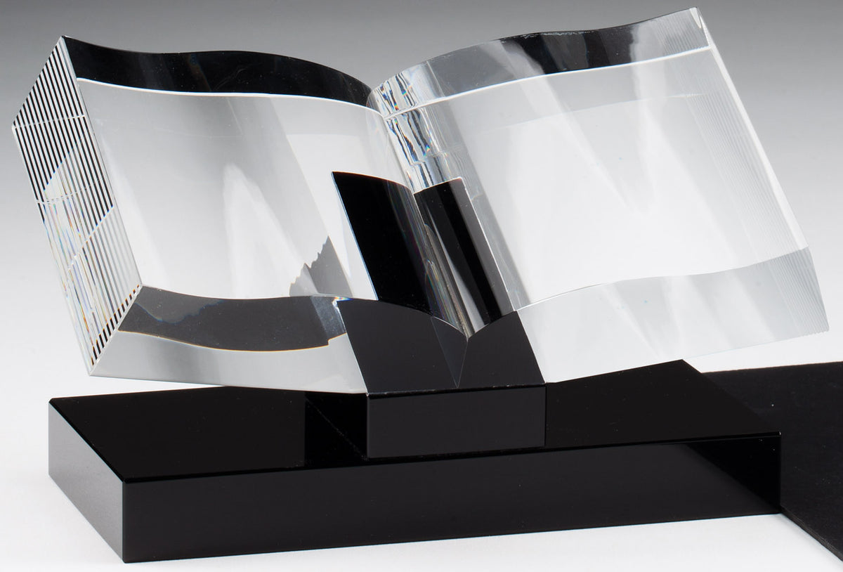 Crystal open book award on a black base