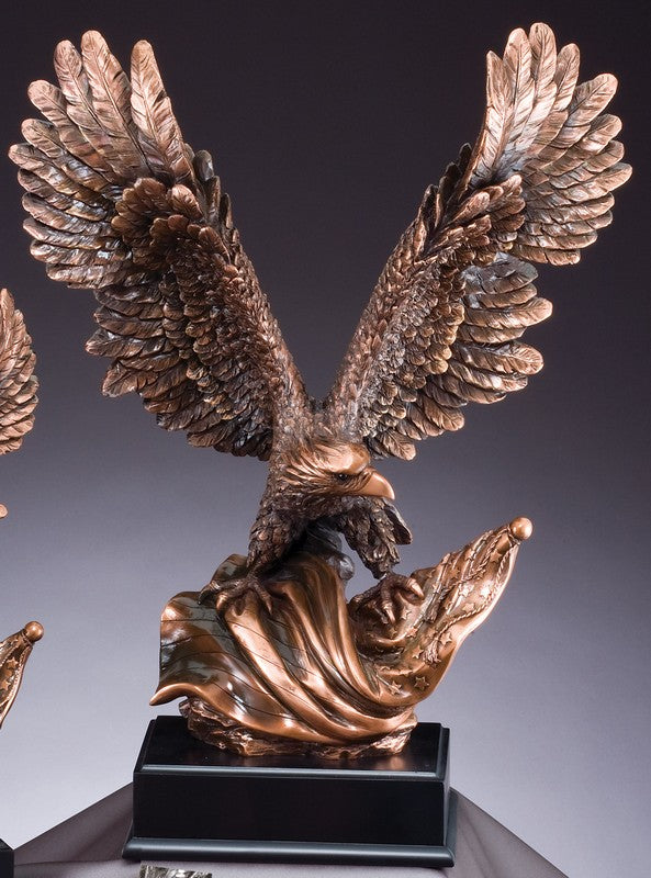 Electroplated bronze eagle with raised wings rising from a flame on a black engraving base, 19" size