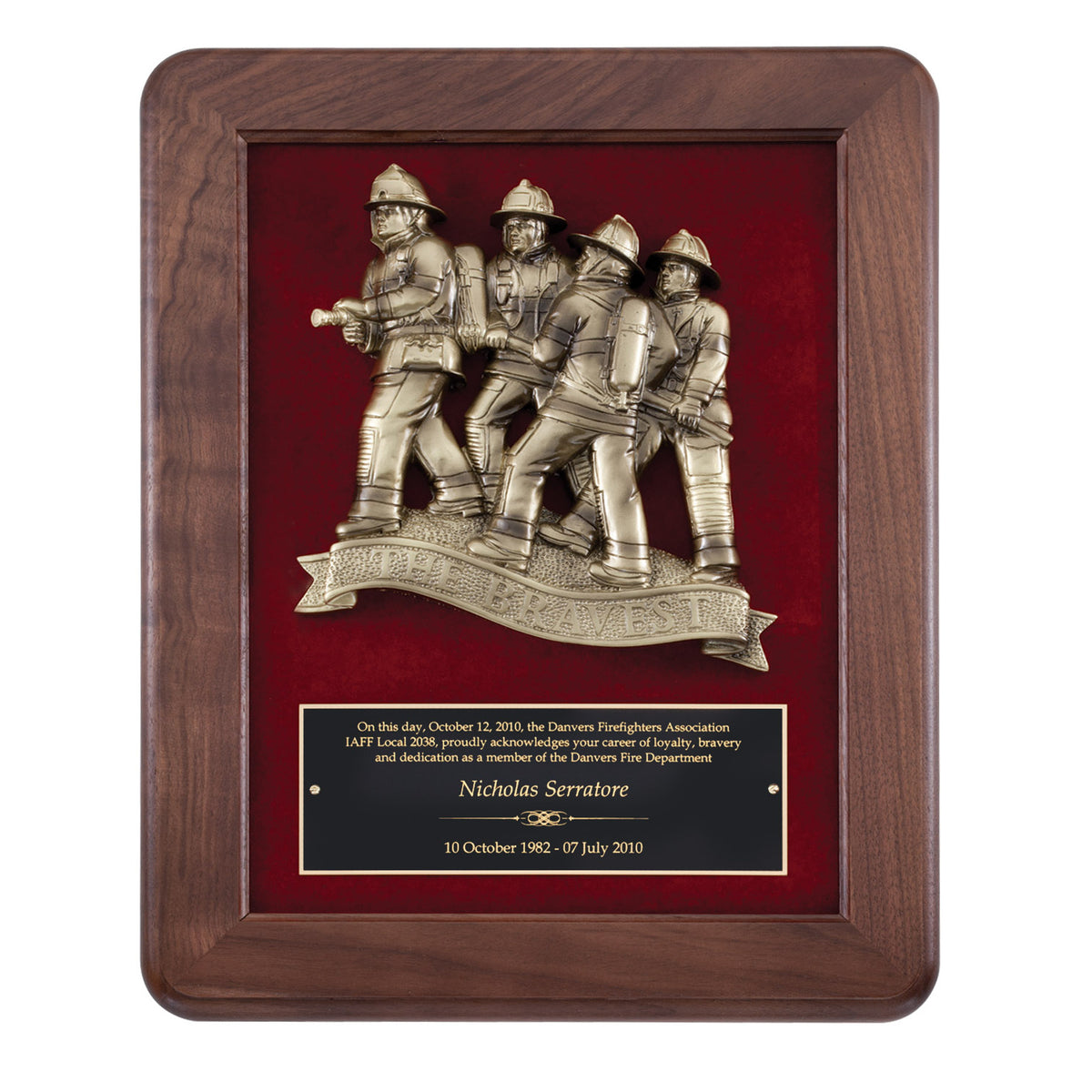 Walnut framed plaque with antique brass casting of four firefighters on red velour