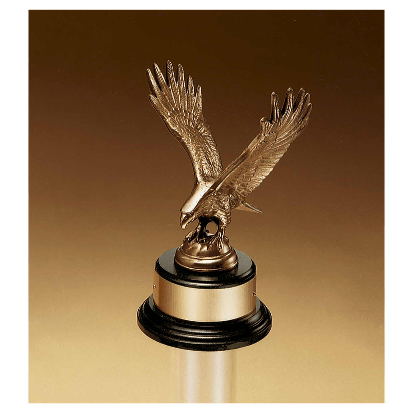 Fully modeled antique bronze eagle casting on a glossy black piano finish base with a gold flex brass engraving plate, 9 inches tall