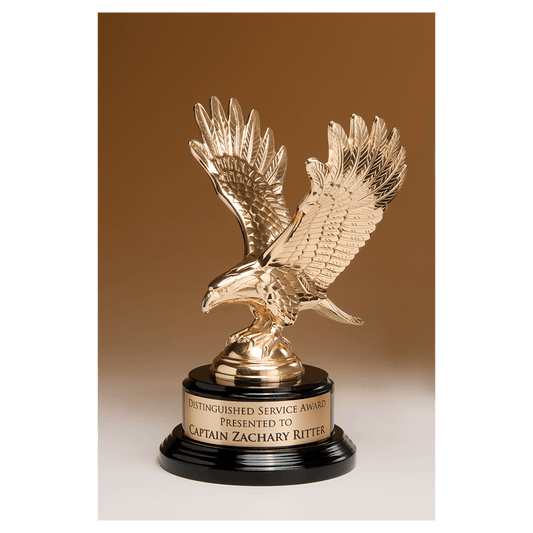 Fully modeled gold finish metal eagle on a glossy black piano finish base with a gold flex brass engraving plate, 9 inches tall