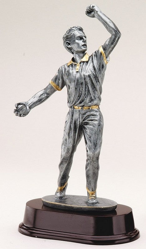 Pewter finish cricket bowler resin trophy on black base with engraving plate, 10 1/2 inches