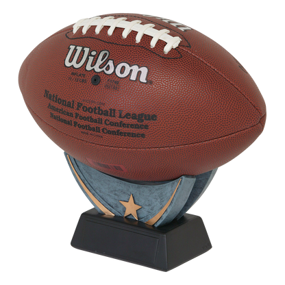 The same resin ball holder shown displaying a full-size football on its black engraving base