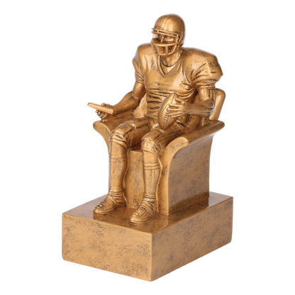 Gold fantasy football armchair trophy viewed from the left, showing the sculpted detail
