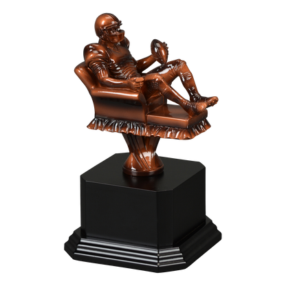 Sculpted fantasy football figure mounted on a black satin monument base, smaller 5 and an eighth inch figure