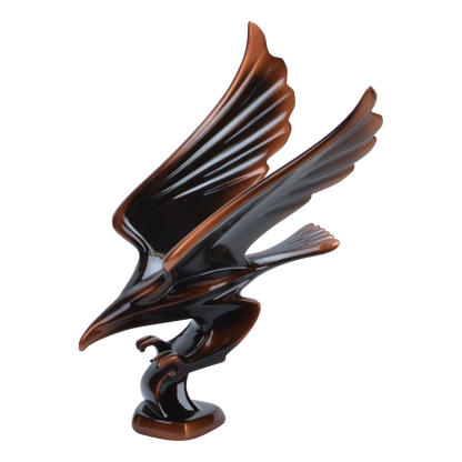 Striking eagle award in cast resin with talons forward and wings back, 6 and a half inch size