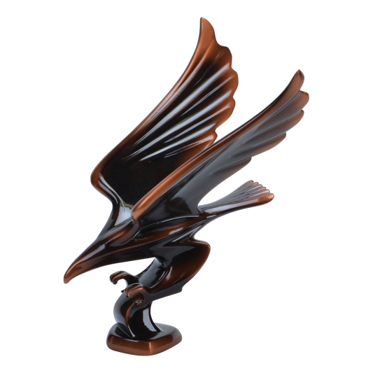 Striking eagle award in cast resin with talons forward and wings back, 6 and a half inch size
