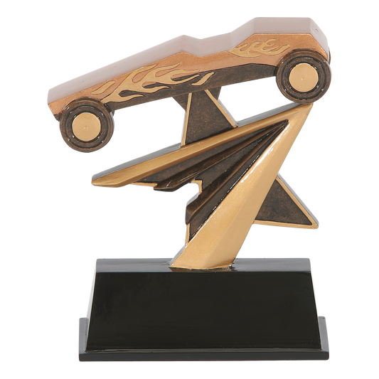 Star Power pinewood derby trophy with a flame-painted car on a gold shooting star over a black base
