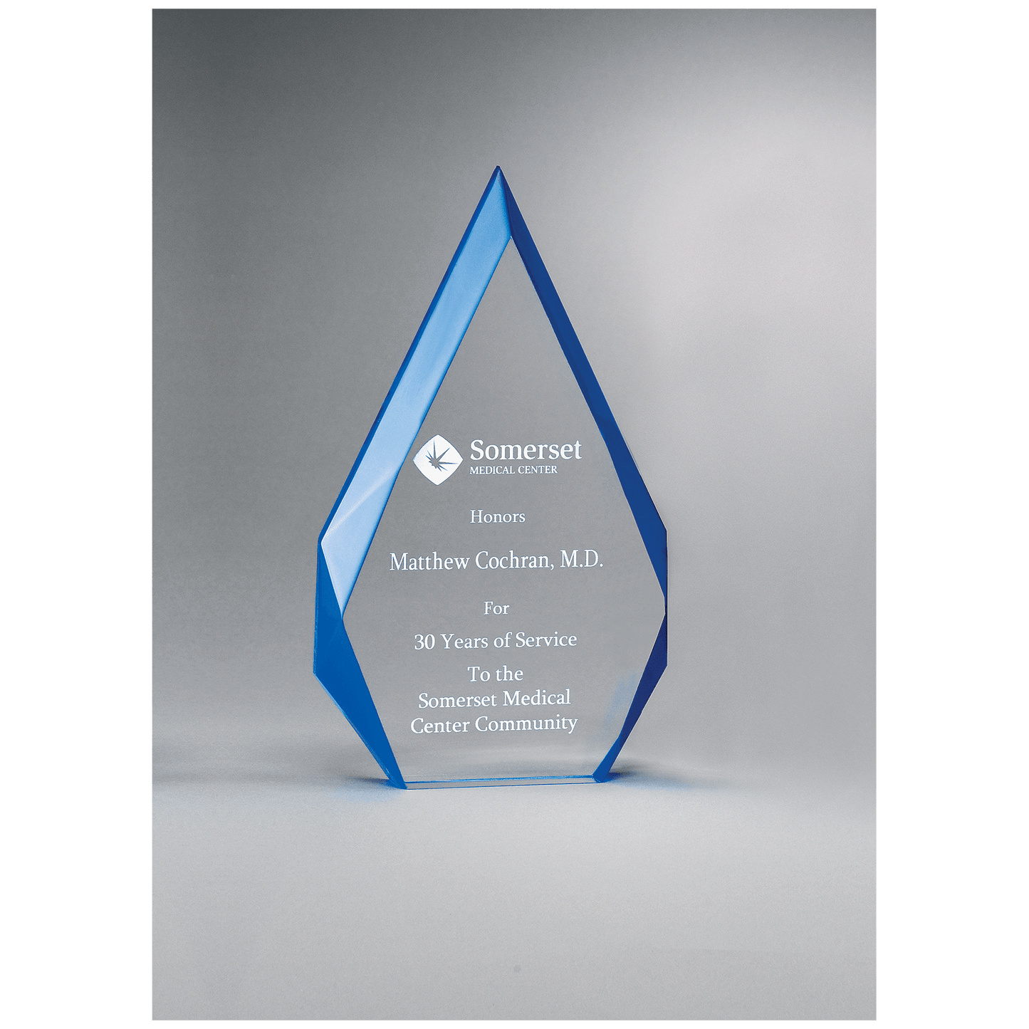 Flame Series clear acrylic award with blue accents, 6¼ x 9⅞ inches, engraved