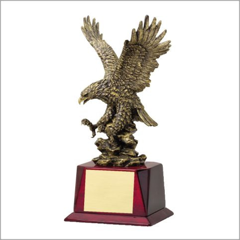 Gold-finish landing eagle with spread wings on a rosewood base with engraving plate, 17" size