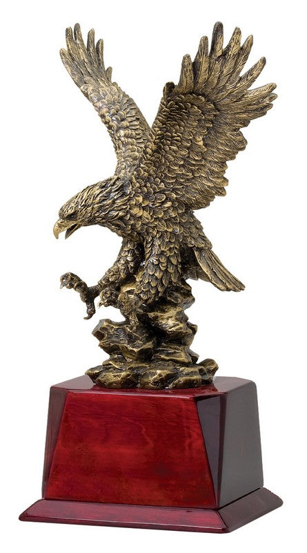 Gold-finish landing eagle with spread wings on a rosewood base with engraving plate, 12" size