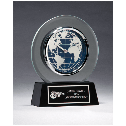 Glass clock with world time dial on a black high gloss base