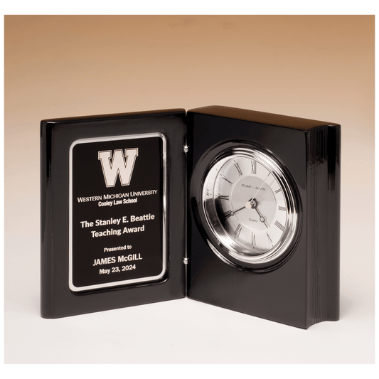 Black piano finish book clock with diamond spun dial and three hand movement