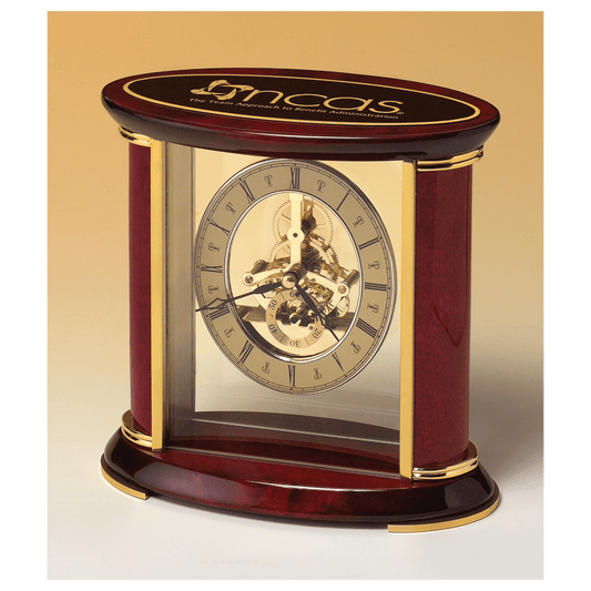 Skeleton clock with sub-second dial, brass finish movement, and rosewood piano accents