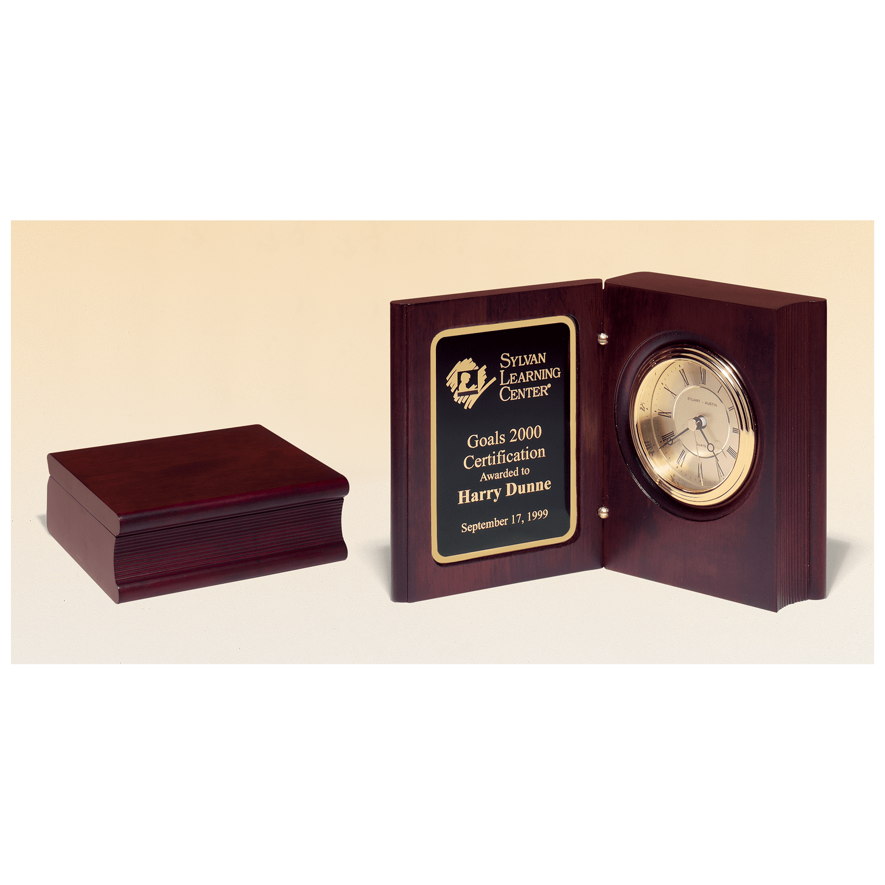 Hand rubbed mahogany book clock with gold spun dial and three hand movement