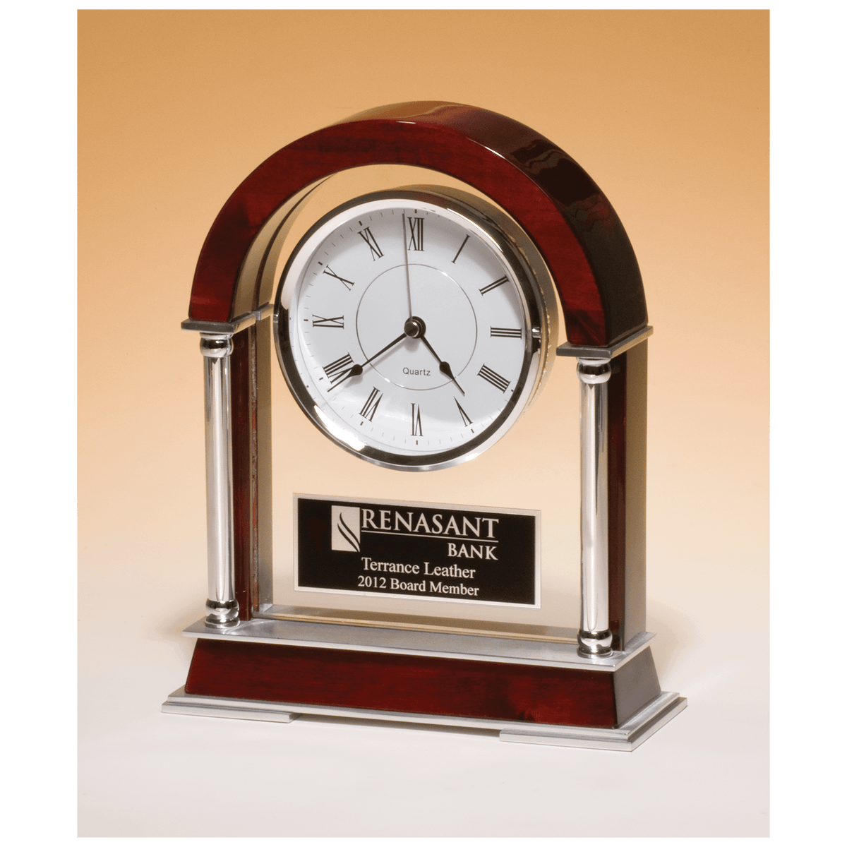 Rosewood piano finish mantle clock with chrome plated posts and silver aluminum accents