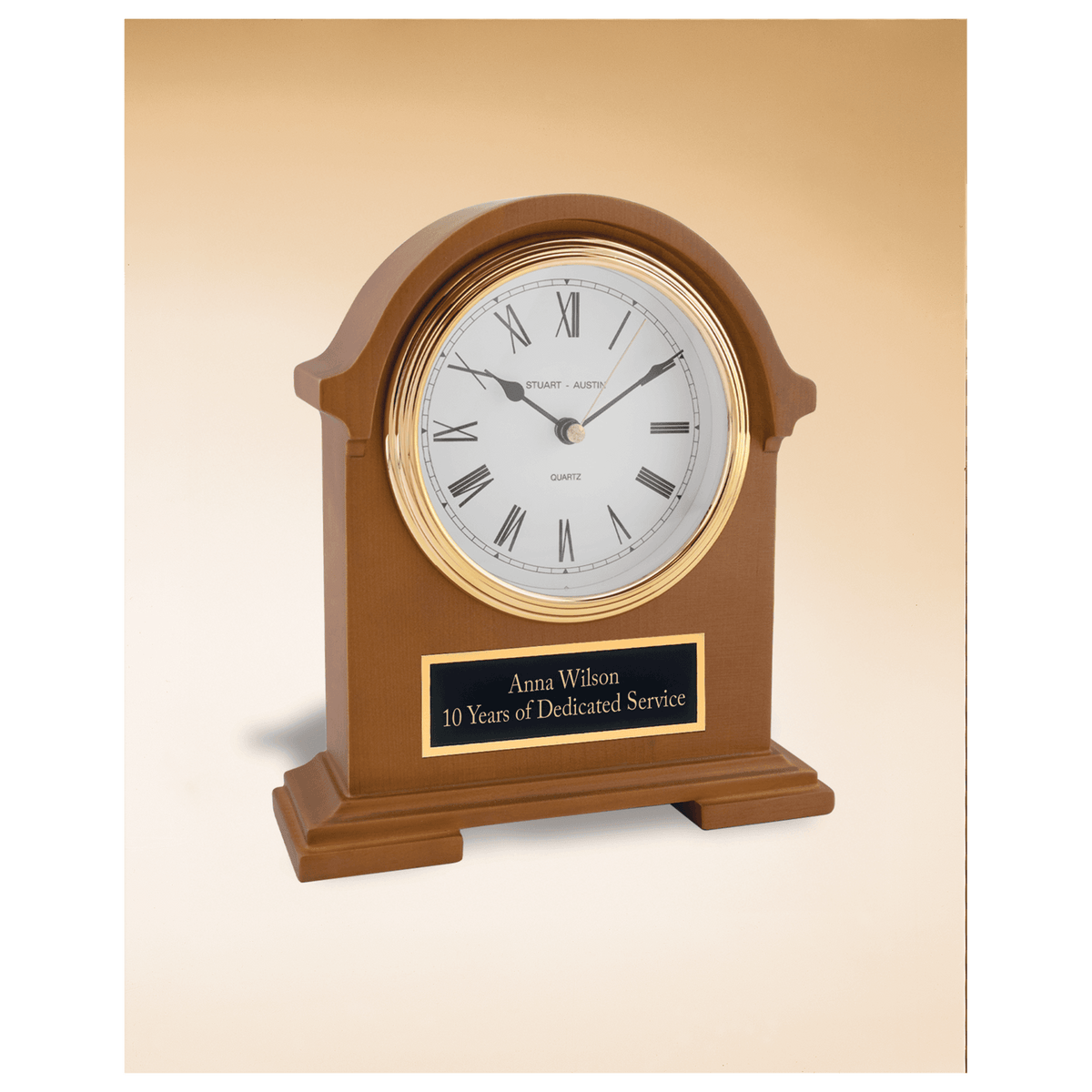 Napoleon clock with traditional styling and deep hand rubbed mahogany finish