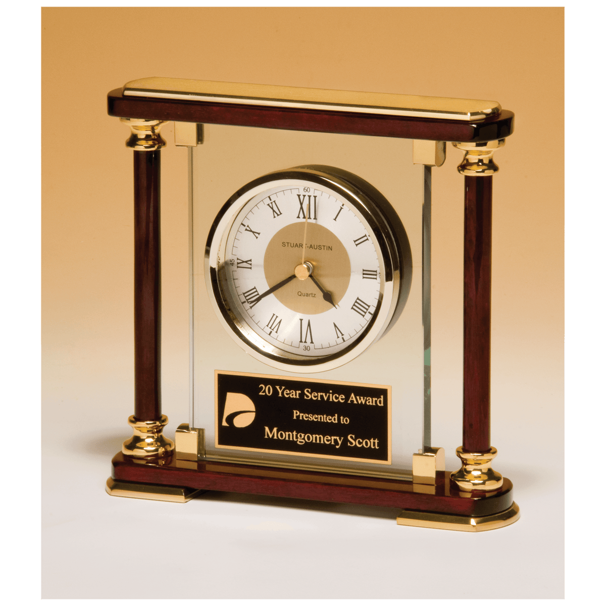 Glass and rosewood piano finish clock with gold metal accents