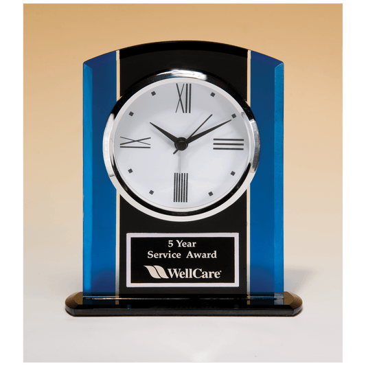 Black and blue glass clock with silver bezel and three hand movement