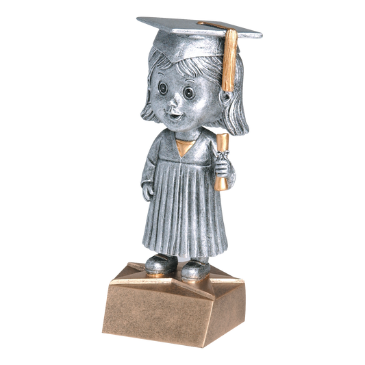 Graduate bobblehead trophy with a silver female graduate in cap and gown holding a diploma