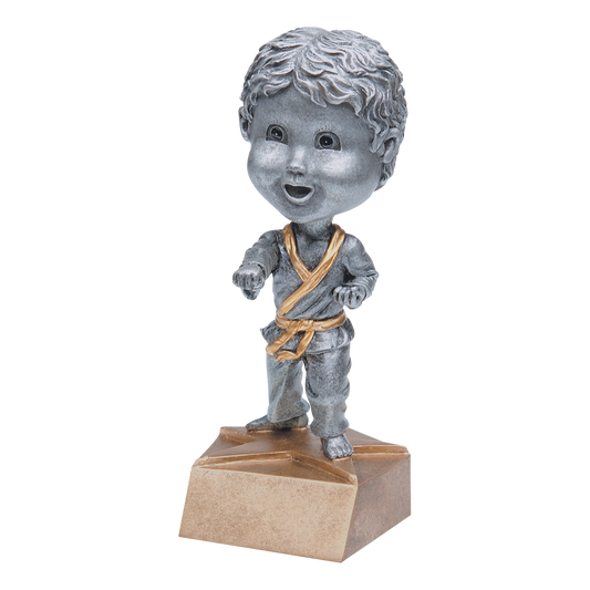 Karate bobblehead trophy with a silver young male student in a gi and gold belt on a tan base