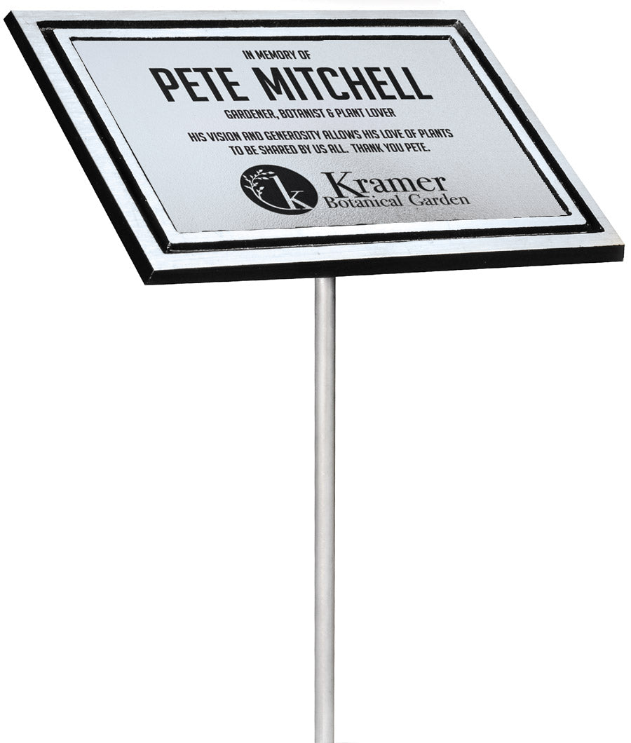 Engraved cast aluminum memorial plaque with silver plate displayed on its aluminum garden stake
