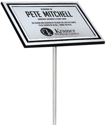 Engraved cast aluminum memorial plaque with silver plate displayed on its aluminum garden stake