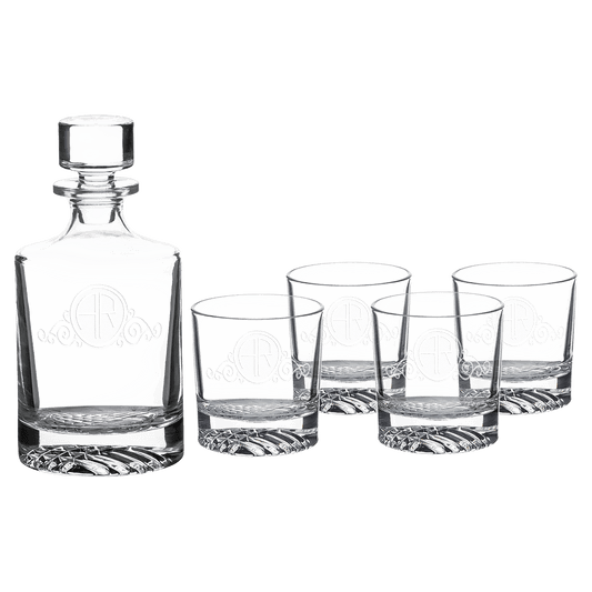 Round glass whiskey decanter set with four matching 9 oz rocks glasses in a black gift box