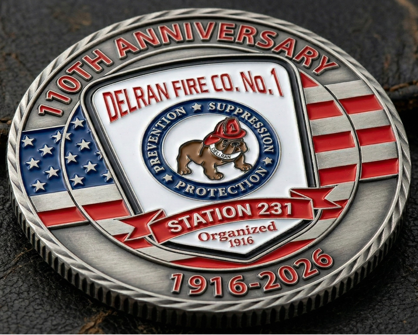 110th Anniversary coin for Delran Fire Co. No. 1 on a dark textured background