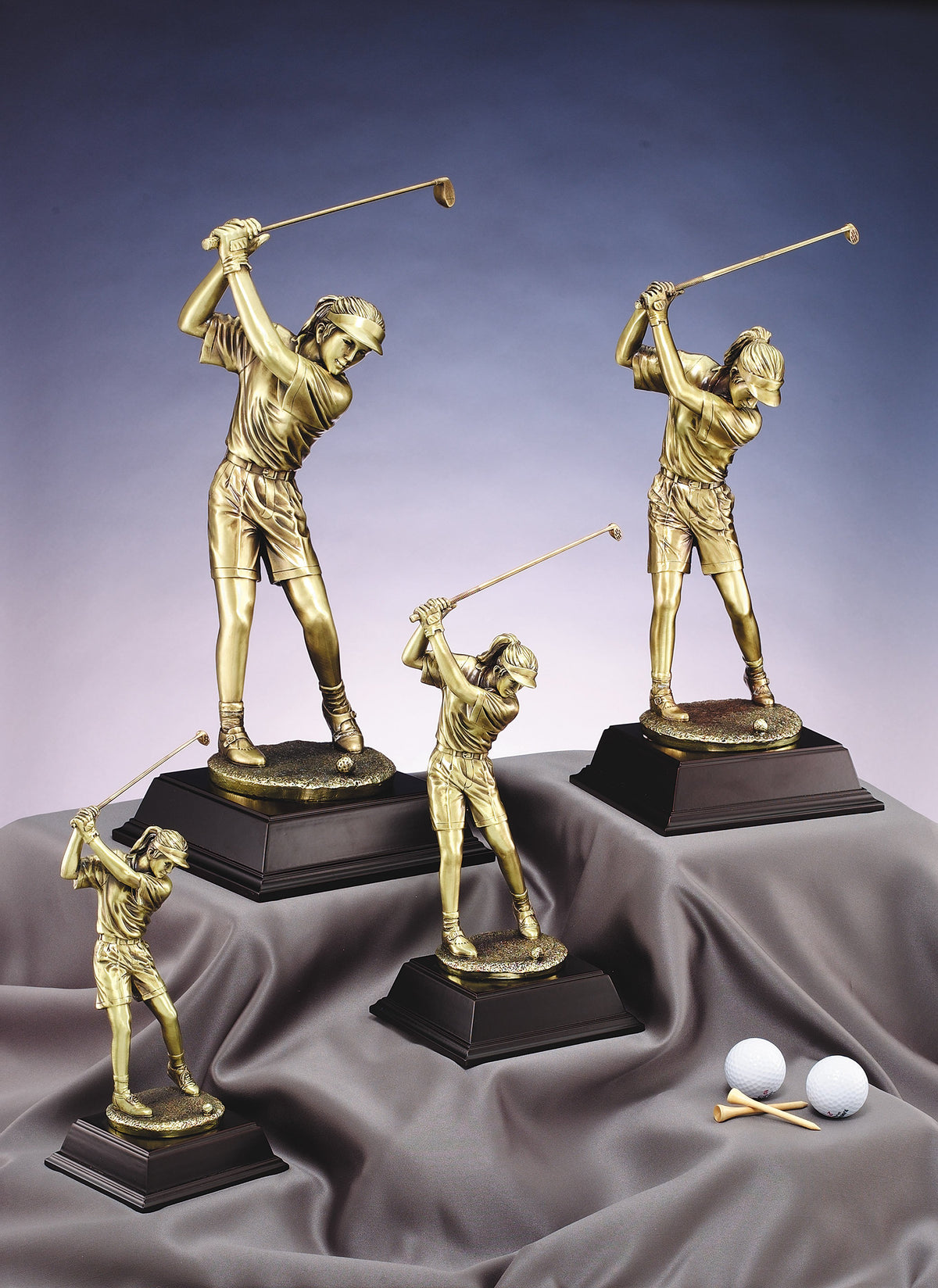 Gold female golfer with a driver, 10" size