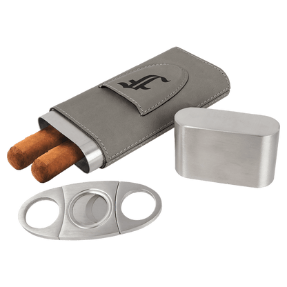 Gray Cigar case with two cigars, a cutter, and stainless steel top on a clear background