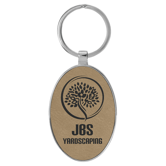 Personalized light brown leatherette keychain with oval metal frame