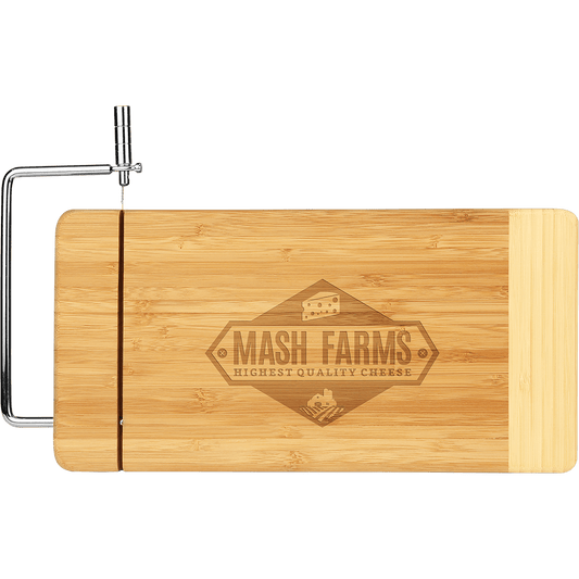 Wooden cutting board with a cheese slicer and 'Mash Farms' branding on a clear background