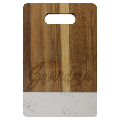 Personalized 9 x 6 inch acacia wood cutting board with white marble accent, engraved