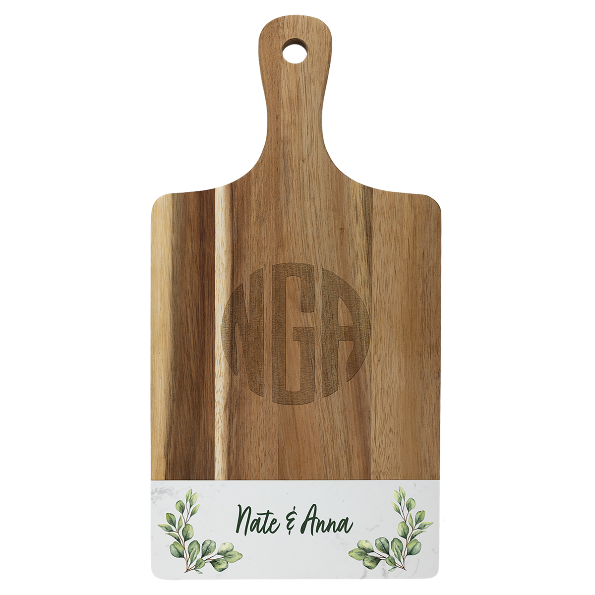 Engraved acacia and white marble paddle board styled with food
