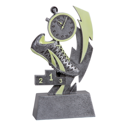 Six-inch pewter-grey resin track and field trophy with glow-in-the-dark green accents on a stepped base