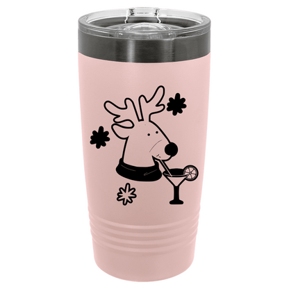 Pink tumbler with a reindeer design holding a cocktail on a white background