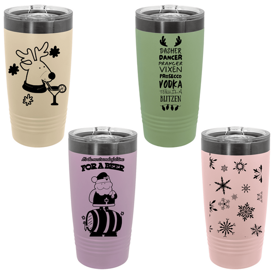 Four tumblers with different christmas designs and colors on a white background