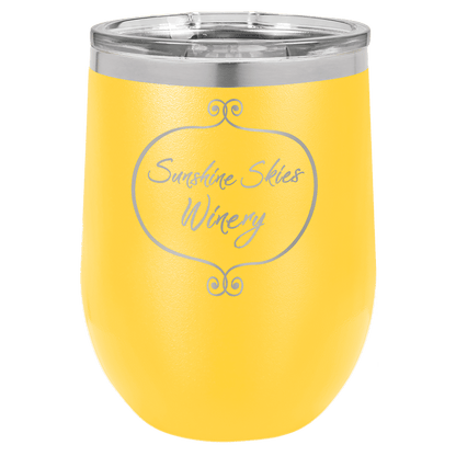 Yellow wine tumbler with 'Sunshine Skies Winery' engraving on a clear background