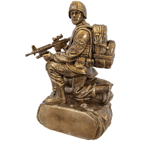 Antique gold military resin award, kneeling soldier with sandbags, 10 inches