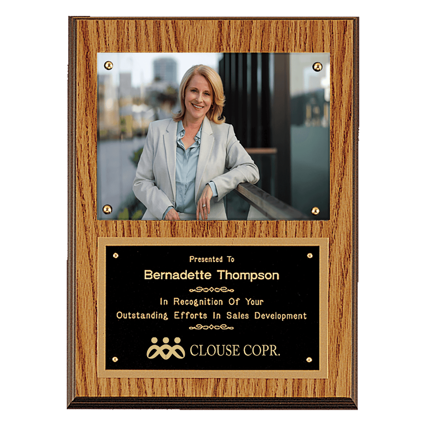 Oak finish 9 by 12 inch photo plaque with black brass engraving plate holding a 5 by 7 inch photo