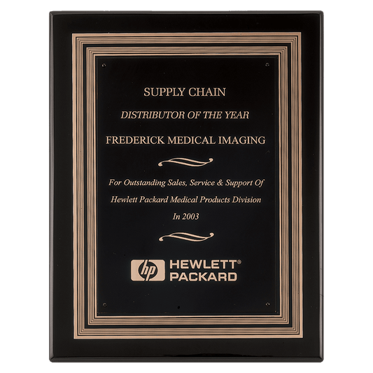 Black piano-finish plaque with black and gold embossed plate