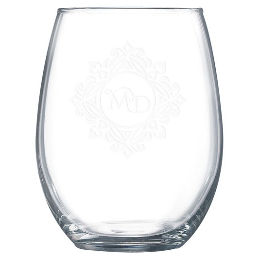 Clear 15 oz. stemless wine glasses with a frosted etched design, shown as a matching set