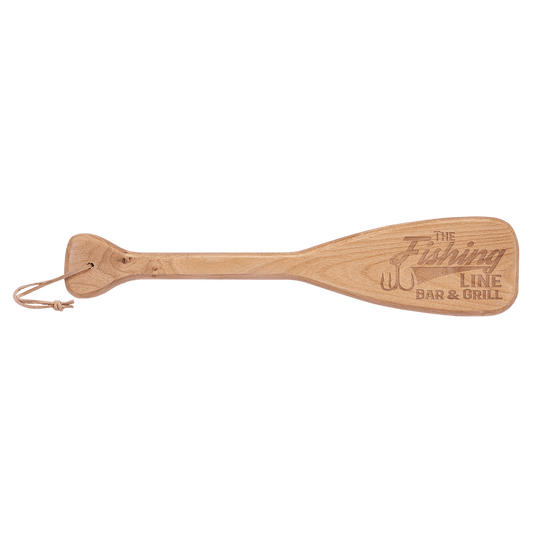 Wooden paddle with 'The Fishing Line Bar & Grill' engraving on a transparent background