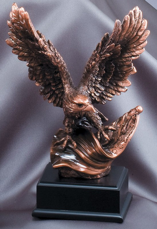 Electroplated bronze eagle with raised wings rising from a flame on a black engraving base, 10" size