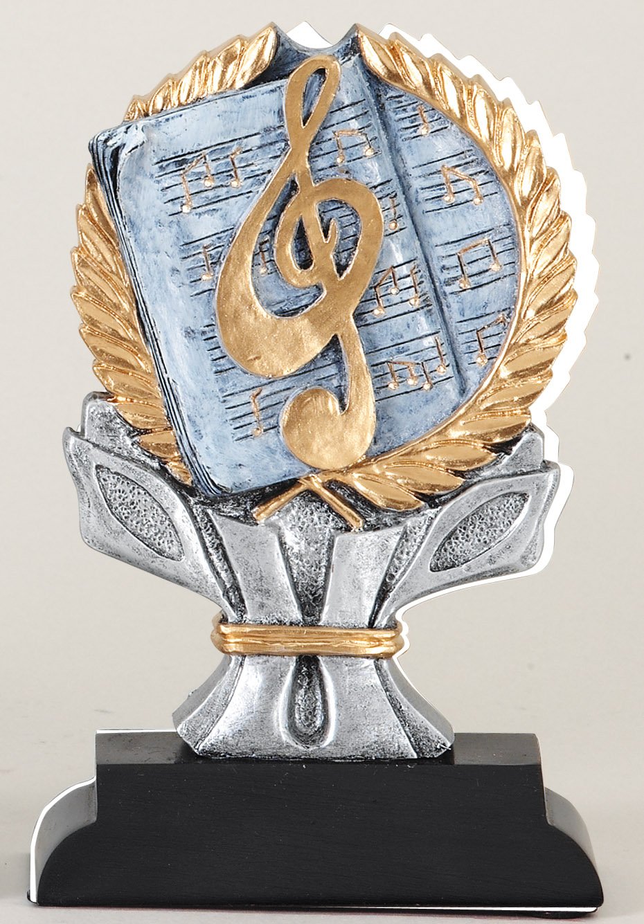 Impact music trophy with treble clef on sheet music