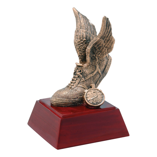 Bronze-tone winged track shoe and stopwatch trophy on a rosewood-finish base